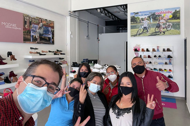 The Top Shoes Team