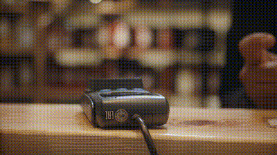 customer pay by card at a clothing store